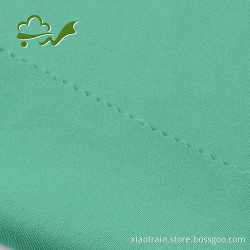 Double knit stock polyester spandex interlock fabric